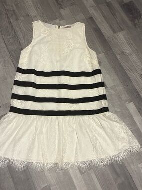 Woman’s Cream Lace Dress with Black Stripe Accents